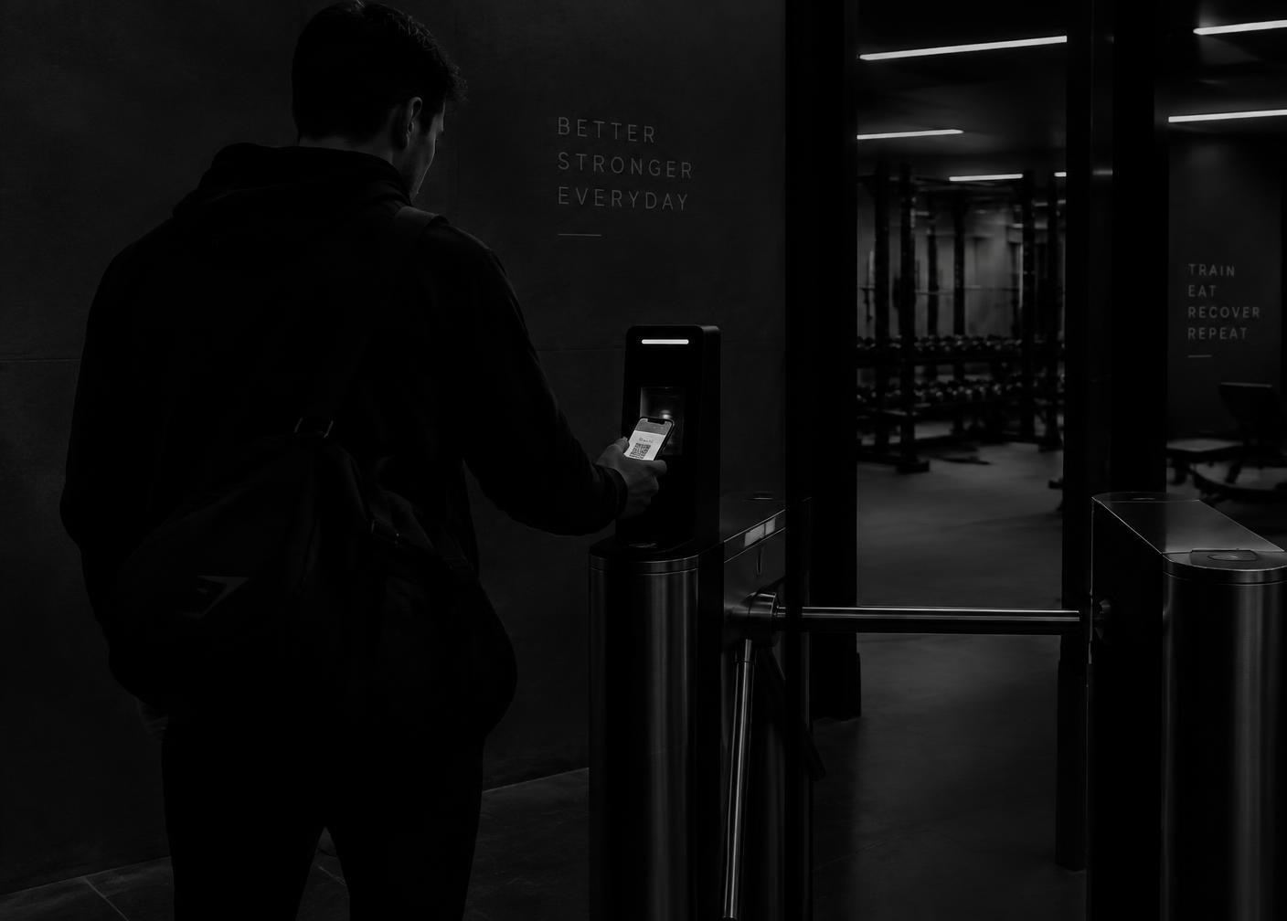Member scanning a phone at the gym entry